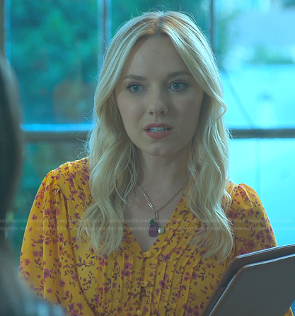 Claire's yellow floral top on Good Trouble