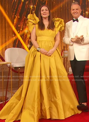 Drew’s yellow ruffle shoulder gown on The Drew Barrymore Show