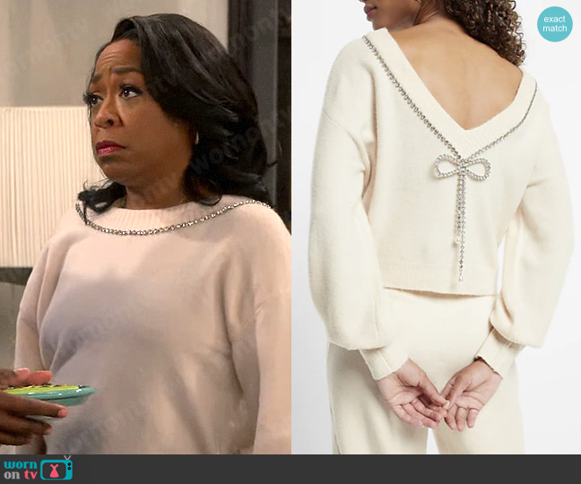 Express Bow Embellished Convertible Sweater worn by Tina (Tichina Arnold) on The Neighborhood