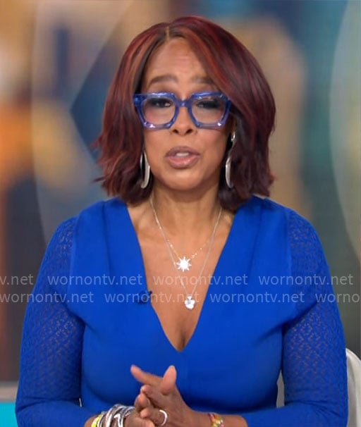 Gayle King's blue v-neck dress with lace knit sleeves on CBS Mornings