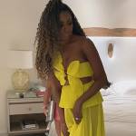 Guerdy’s yellow bow embellished dress on The Real Housewives of Miami