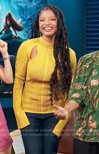 Halle Bailey's yellow ribbed cutout sweater on Access Hollywood