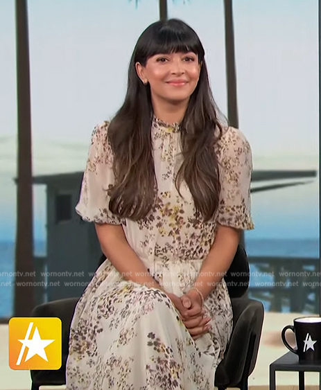 Hannah Simone’s beige floral dress on Access Hollywood
