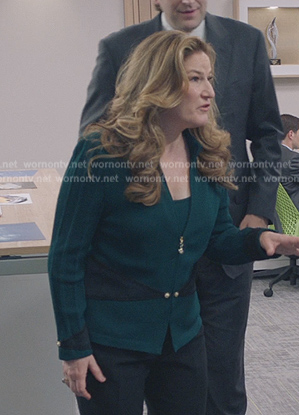 Katherine's green cardigan on American Auto