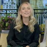 Kelly’s black blouse and green pants on Live with Kelly