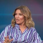 Kit’s purple floral striped blouse on Access Hollywood