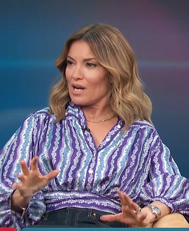 Kit’s purple floral striped blouse on Access Hollywood