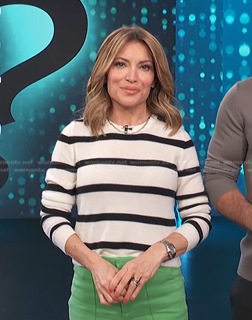 Kit’s white striped sweater and green flare pants on Access Hollywood