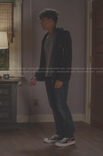 Lucas Adams’s grey henley shirt and sneakers on Greys Anatomy