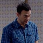 Max’s blue plaid short-sleeve shirt on Call Me Kat