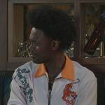 Noah’s white tiger patch shirt on Grand Crew