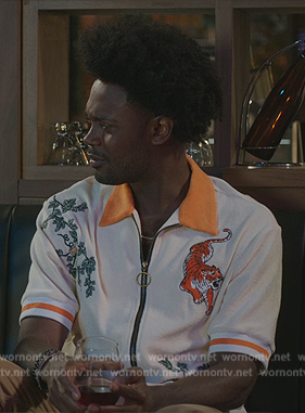 Noah's white tiger patch shirt on Grand Crew