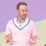 Paul Zahn’s pink varsity stripe sweater on Access Hollywood