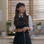 Sam’s polka dot sweater vest and pleated skirt on Not Dead Yet