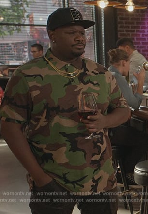 Sherm's camo print polo on Grand Crew