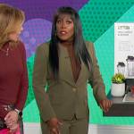Sheryl’s green blazer and pants on The Talk