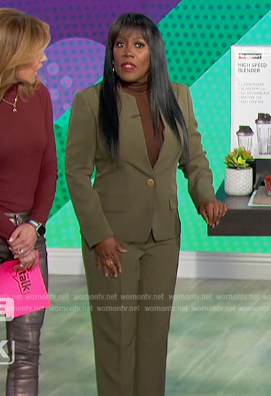 Sheryl’s green blazer and pants on The Talk