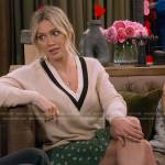 Sophie’s stripe trim v-neck sweater, green floral skirt and loafers on How I Met Your Father