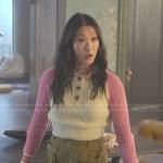 Sumi's pink colorblock polo sweater and olive green pants on Good Trouble