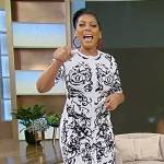 Tamron’s white jacquard sheath dress on Tamron Hall Show