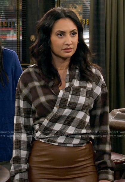 Valentina’s mixed plaid shirt and leather pencil skirt on How I Met Your Father