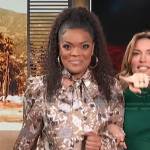 Yvette Nicole Brown’s brown floral tie neck blouse on Access Hollywood