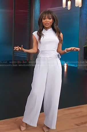 Zuri's pale lavender cutout top and wide leg pants on Access Hollywood