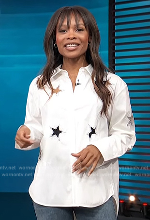 Zuri’s white star cutout shirt on Access Hollywood