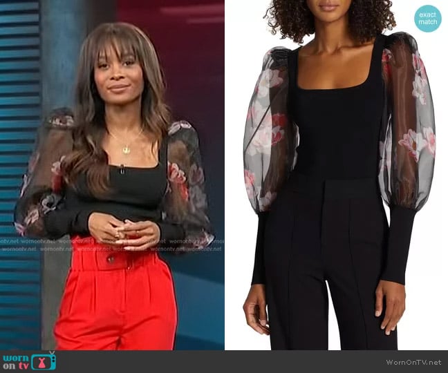 Alice + Olivia Abella Floral Puff-Sleeve Top worn by Zuri Hall on Access Hollywood