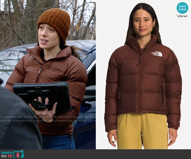 The North Face 1996 Retro Nuptse Jacket in Dark Oak worn by Kim Burgess (Marina Squerciati) on Chicago PD