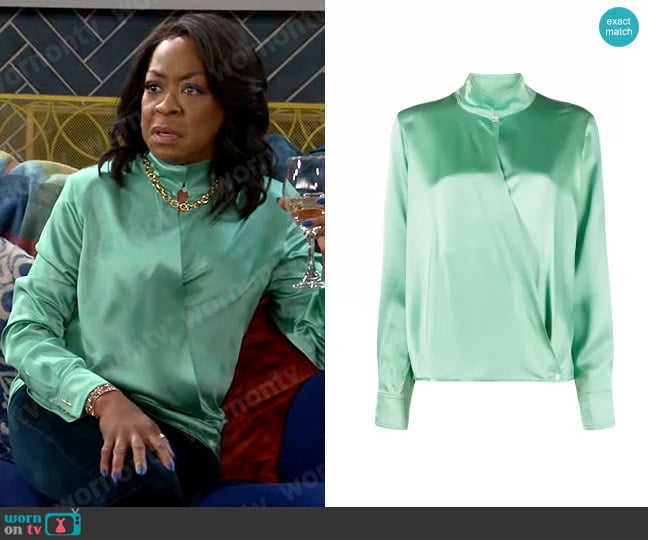 Victoria Beckham High Neck Silk Blouse worn by Tina Butler (Tichina Arnold) on The Neighborhood