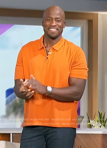 Akbar’s orange ribbed polo on The Talk