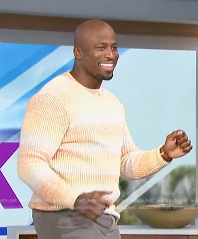 Akbar’s orange stripe ribbed sweater on The Talk