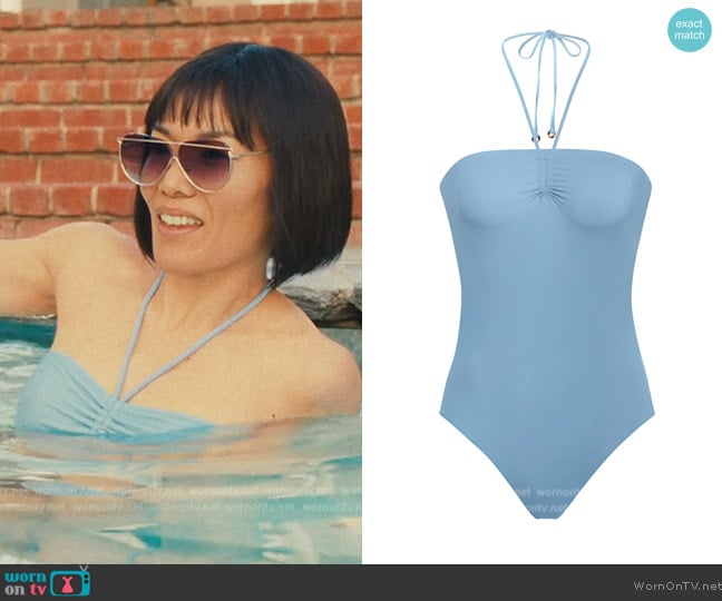 Amy’s blue halter neck swimsuit on Beef