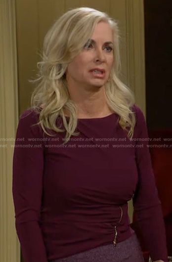 Ashley’s burgundy asymmetric zip top on The Young and the Restless