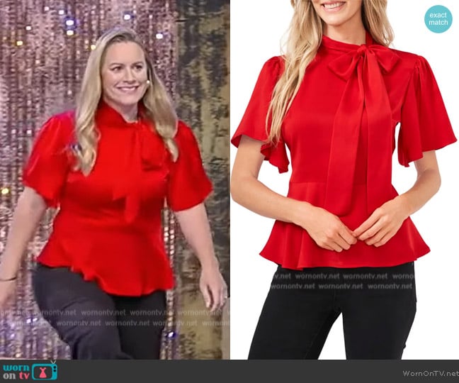 Cece Tie-Neck Peplum Hem Blouse worn by Michelle Figueroa on Tamron Hall Show