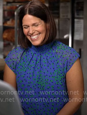 Dana Jacobson’s blue and green floral top on CBS Saturday Morning