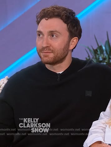 Daryl Sabara's black face logo sweater on The Kelly Clarkson Show