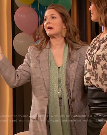 Drew’s gray plaid blazer and tie neck blouse on The Drew Barrymore Show