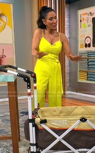 Elizabeth Werner’s yellow eyelet jumpsuit on CBS Mornings