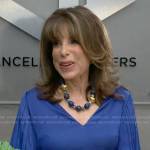 Esther’s blue v-neck top with pleated sleeves on The Young and the Restless