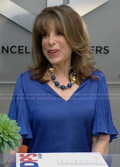 Esther's blue v-neck top with pleated sleeves on The Young and the Restless