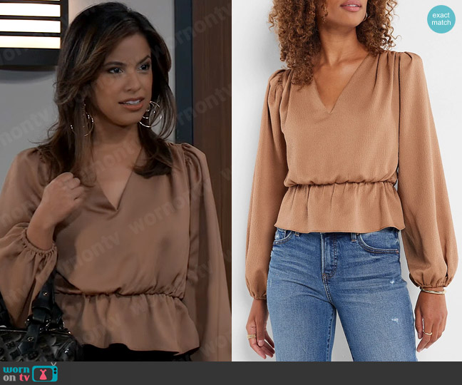 Express Long Sleeve V-Neck Peplum Top in Butterscotch worn by Alison 'Blaze' Rogers (Jacqueline Grace Lopez) on General Hospital