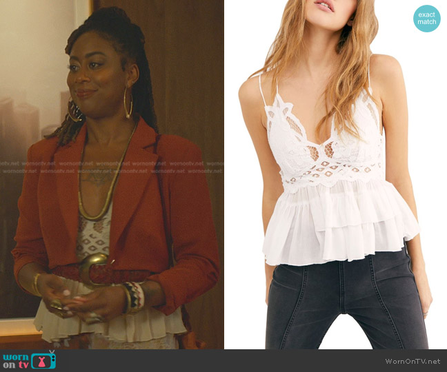 WornOnTV: Malika's white peplum top and orange cropped blazer on