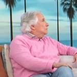 Henry Winkler’s pink cable knit sweater on Access Hollywood