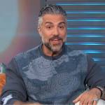 Jaime Camil’s gray cloud print sweatshirt on Access Hollywood