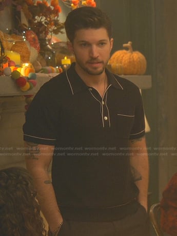 Joaquin Peréz’s black contrast trim polo shirt on Good Trouble