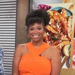 Jocelyn Delk Adams’s orange halter dress on Access Hollywood