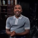 Justin’s grey contrast stripe polo shirt on E! News