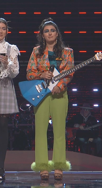 Kate Cosentino's orange floral blazer and green feather trim pants on The Voice